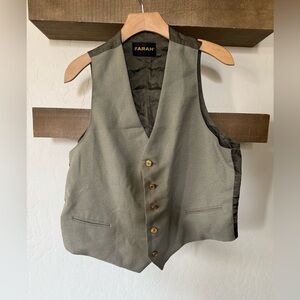 Farah|Sleeveless vest in neutral tone with gold buttons, oversized boxy style•••
